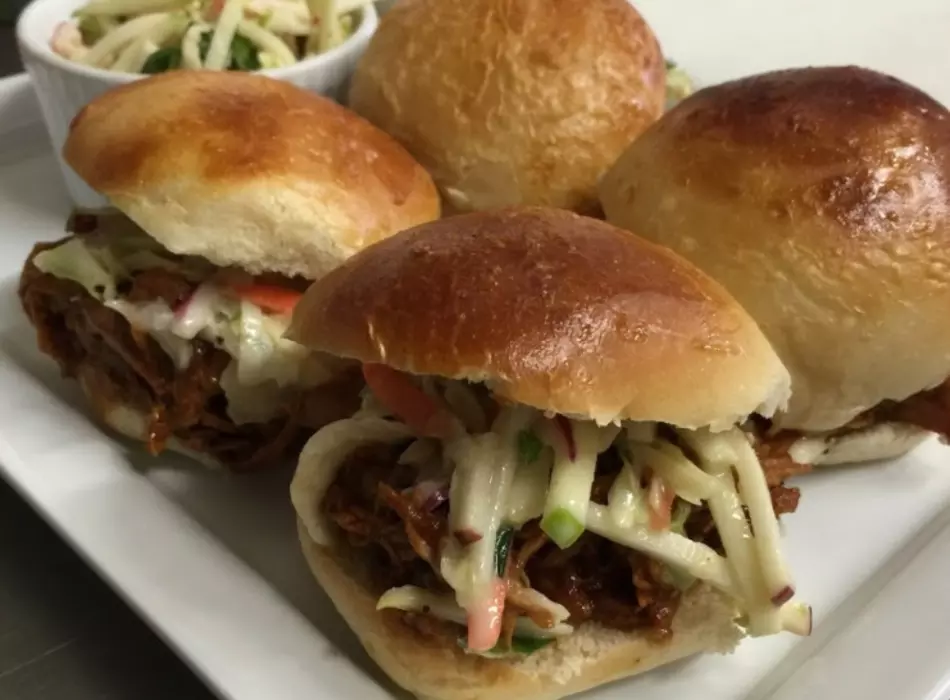 BBQ Pulled Pork Sliders topped with house made Cole Slaw