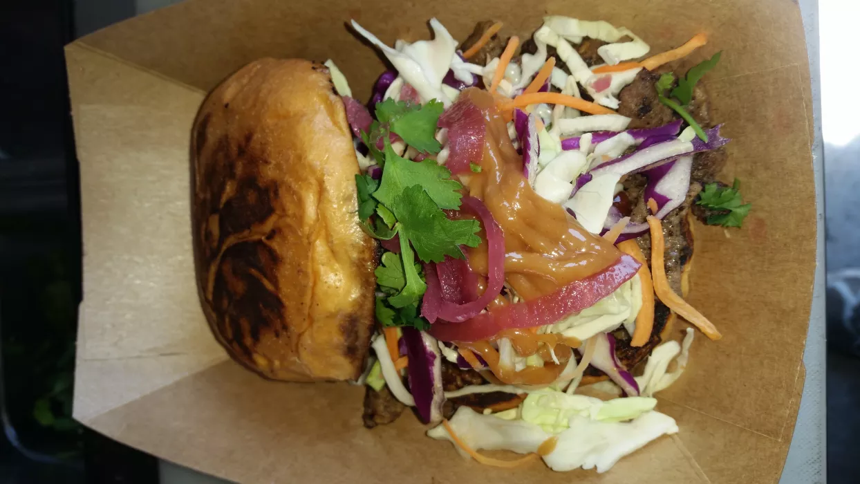 Char Shu Pork Sandwich with Chipotle BBQ Cucumber Wasabi Asian slaw.
