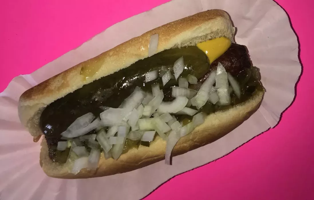 Our delicious dog topped with yellow mustard, fresh chopped onion and a housemade dill pickle