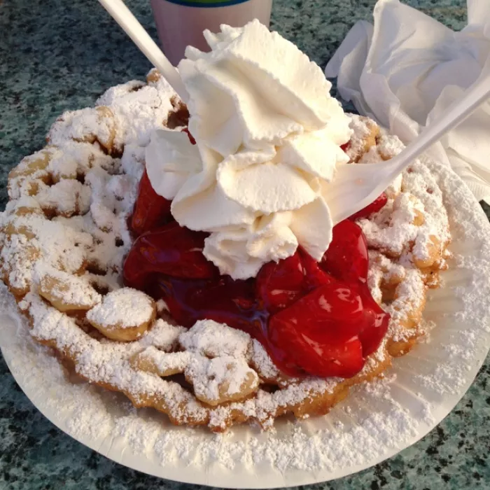 Funnel cake with strawberry topping