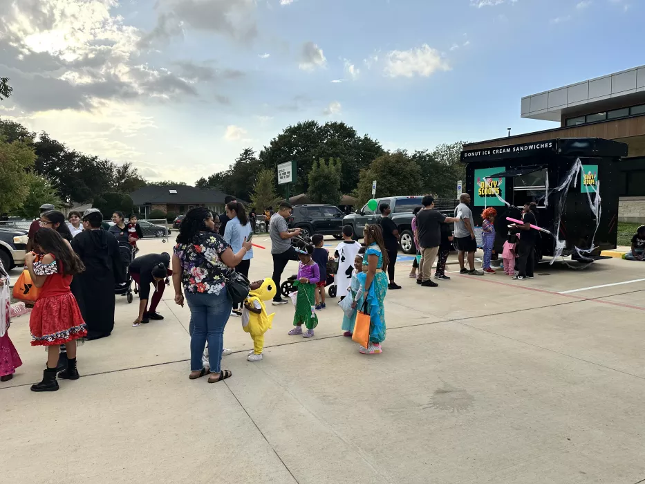 Kids in costumes LOVE ice cream!
