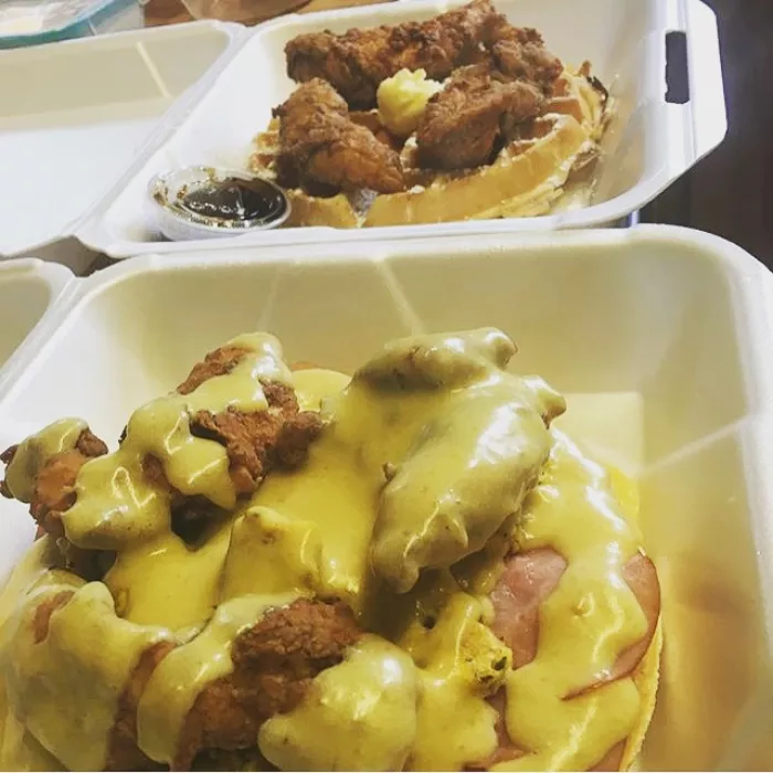 Yummy our OG with wings and our Eggs Benny waffle