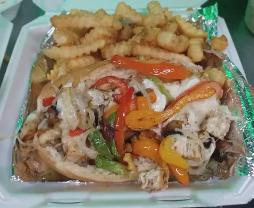 This is our Chicken Philly with Bell peppers, Onions and Mushrooms with Seasoned Fries