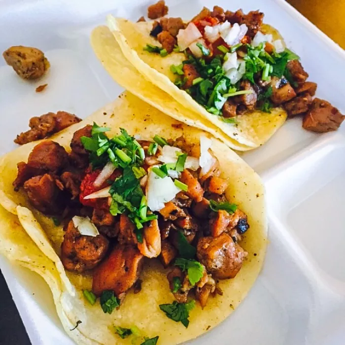 Teriyaki Chicken Street Tacos with sweet Maui onion, cilantro, and spicy salsa.
