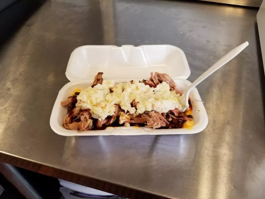 The &quot;Pit&quot; our most popular menu item. It's a layered bowl of smoked mac&amp;cheese, baked &quot;pit&quot; beans and your choice of meat with cole slaw on the side. The best of everything in a bowl!